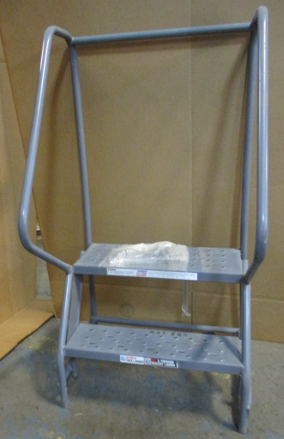 New Open Box Tri-Arc 2-Step Rolling Steel Warehouse Ladder 450 Lb Cap. 53508NADC